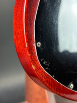 Close-up of a guitar's soundhole with a wooden finish
