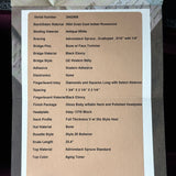 Technical specifications sheet for a guitar on a wooden surface