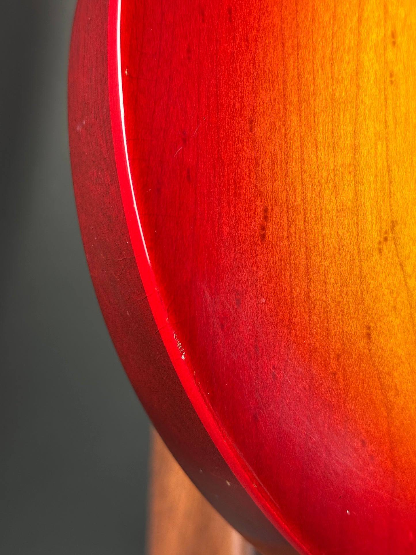 Close-up of a red and orange gradient surface