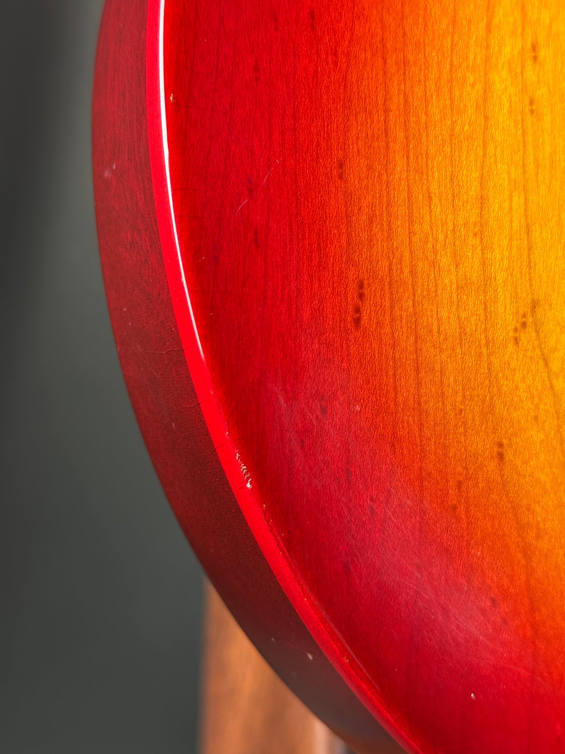 Close-up of a red and orange gradient surface