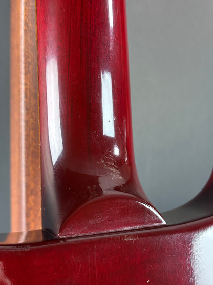 Wear on back of neck of Used 1997 Gibson Les Paul Studio Double Cut Cherry Sunburst.