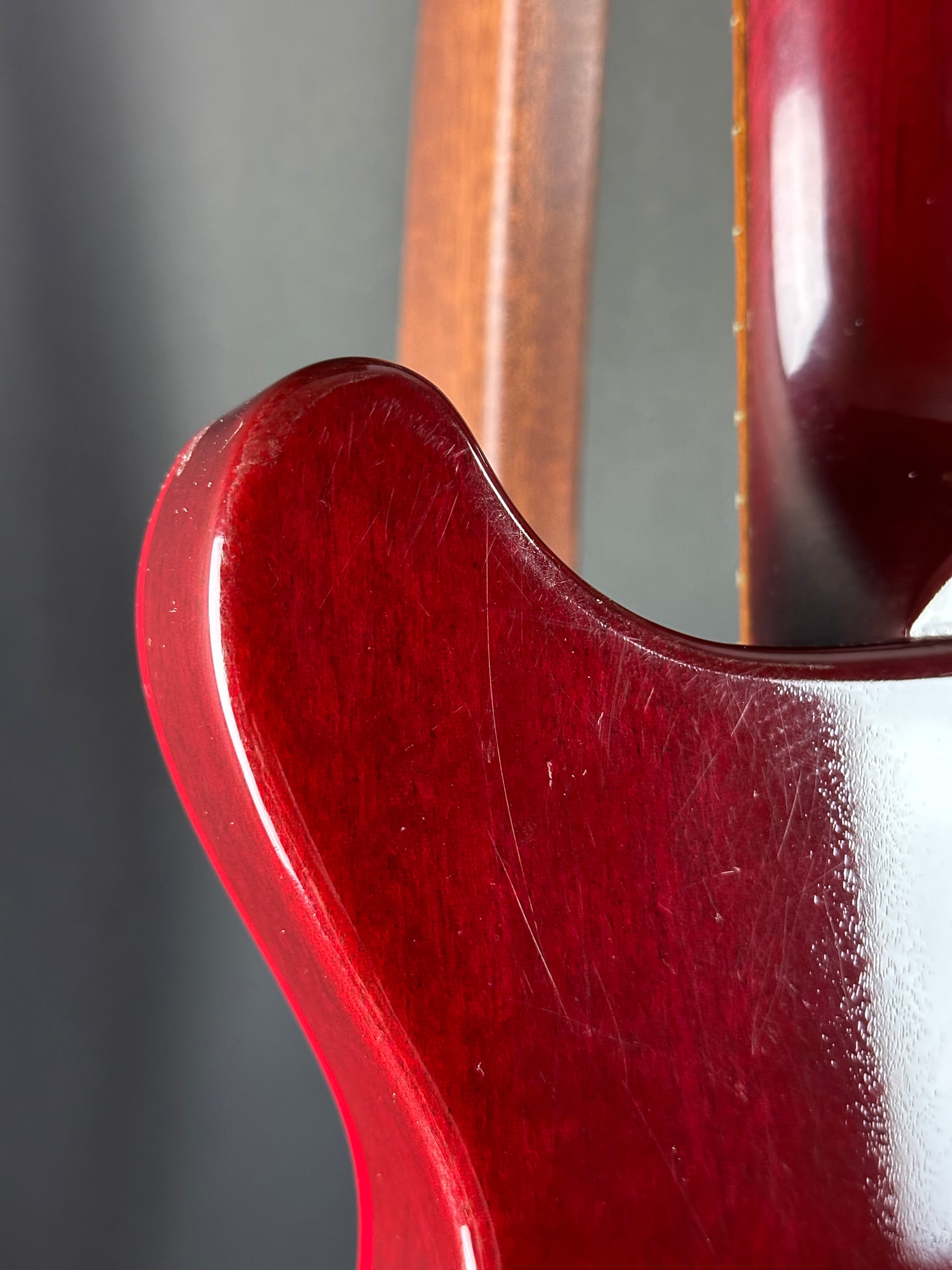 Wear on back of Used 1997 Gibson Les Paul Studio Double Cut Cherry Sunburst.