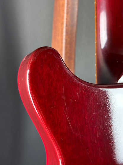 Wear on back of Used 1997 Gibson Les Paul Studio Double Cut Cherry Sunburst.