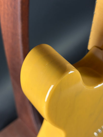 Close-up of a yellow object with a blurred background