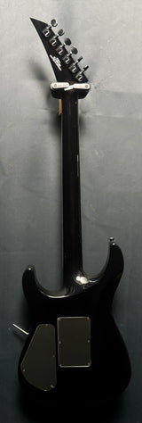 Black electric guitar on a gray background