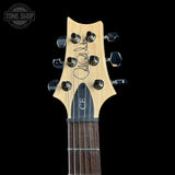 Headstock of 2024 PRS Paul Reed Smith CE24 Semi-Hollow Quilt Black Amber.