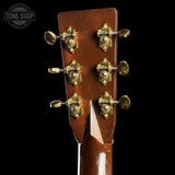Guitar headstock with tuning pegs on a black background, featuring 'Tone Shop' logo.