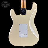 Electric guitar body with a visible brand logo on a black background