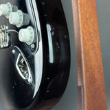 Wear on side of Used 2000 Fender American Vintage '57 Strat Blk.