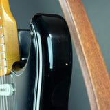 Wear on body of Used 2000 Fender American Vintage '57 Strat Blk.