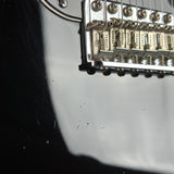 Wear on body of Used 2000 Fender American Vintage '57 Strat Blk.