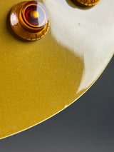 Ding on bottom edge of Used 1996 Epiphone Les Paul Standard Gold Top.