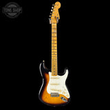 Electric guitar with a sunburst finish on a black background, featuring the Tone Shop logo.