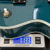 Used Epiphone Emperor Swingster Delta Blue Metallic on scale displaying weight.