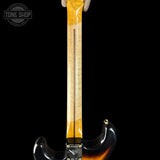 Guitar neck with tortoiseshell pattern on a black background, featuring 'Tone Shop' logo.