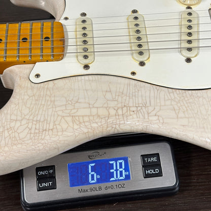 Used 2020 Whitfill Custom Guitars S Style Hardtail Olympic White on a scale displaying weight.