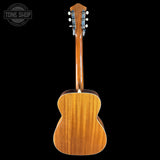 Back view of a wooden acoustic guitar on a black background with 'Tone Shop' logo.