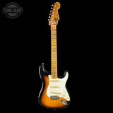 Electric guitar with a sunburst finish on a black background, featuring the Tone Shop logo.