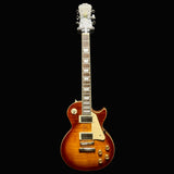 Electric guitar with a sunburst finish on a black background