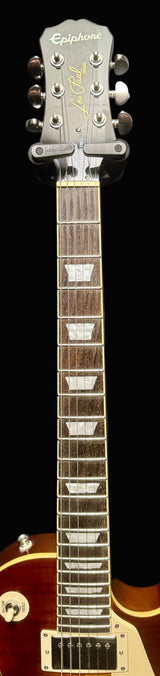 Electric guitar with Epiphone logo on a dark background