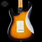 Electric guitar body with a sunburst finish on a black background, featuring the Tone Shop logo.