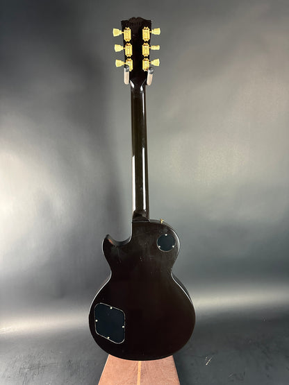 Electric guitar on a reflective gray surface