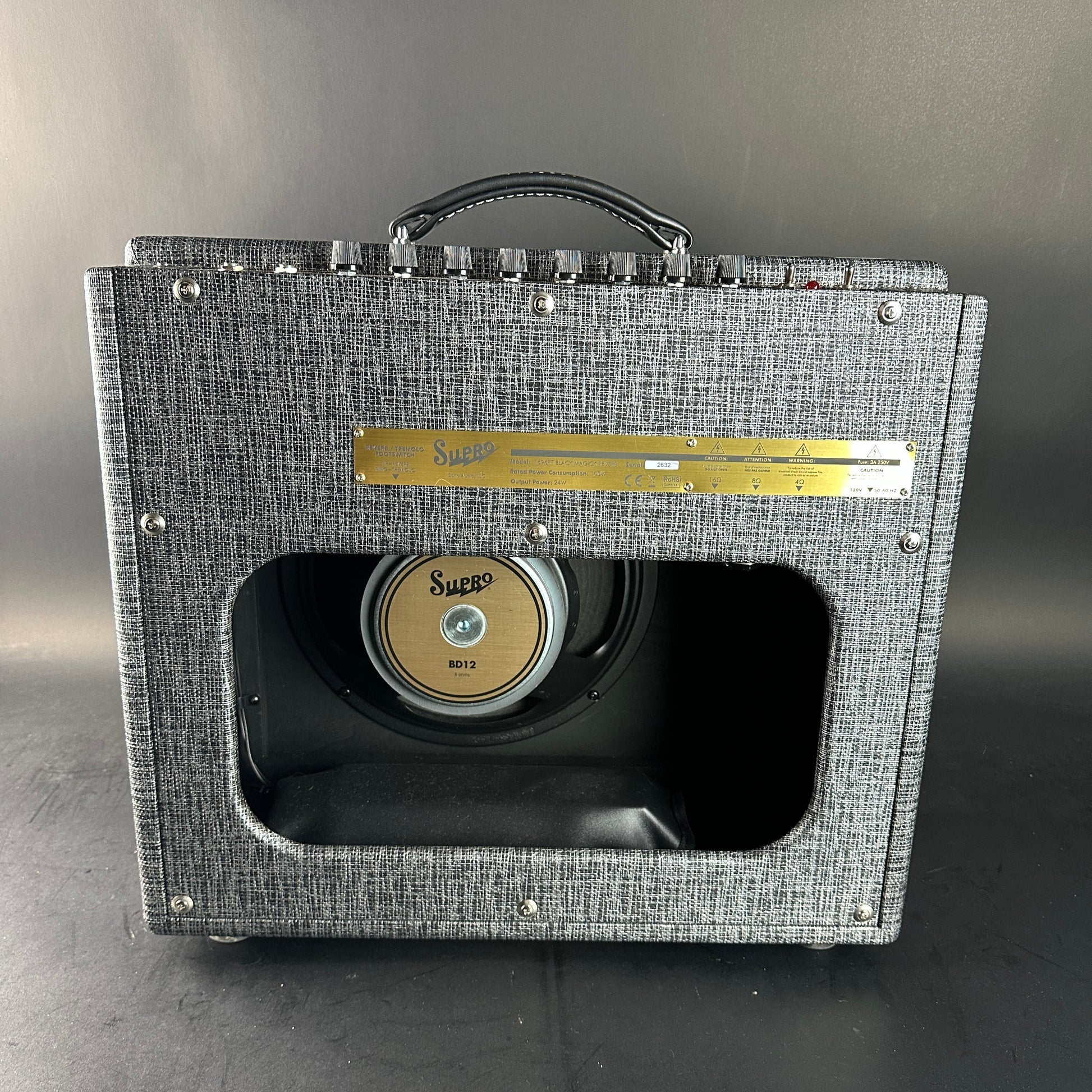 Guitar amplifier with a visible brand logo on a gray background