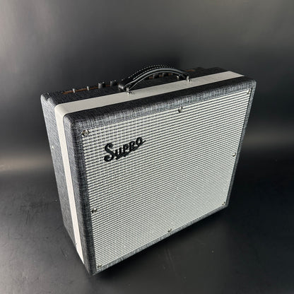 Supro guitar amplifier on a dark background