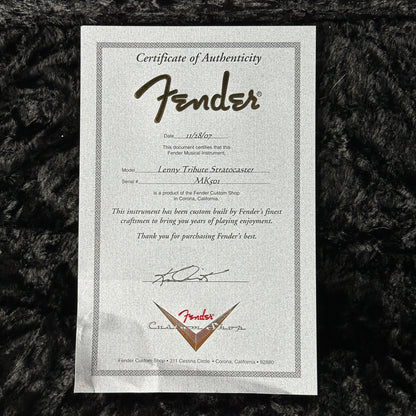 Fender Certificate of Authenticity on a textured black background