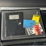 Fender Custom Shop case with concert posters and backstage passes