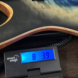 Used Mayones Duvell Elite Pro 6 Galaxy Eye Blue Satin on scale displaying weight.