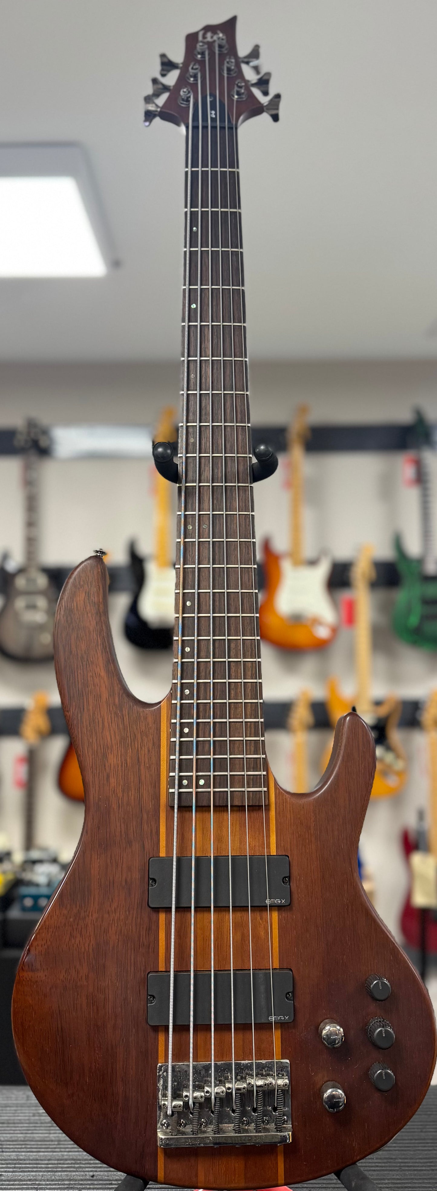 Front of whole Used 2017 ESP LTD D-6 Six String Bass Natural-Satin w/Case TSS6436