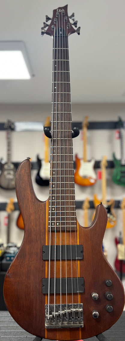 Front of whole Used 2017 ESP LTD D-6 Six String Bass Natural-Satin w/Case TSS6436