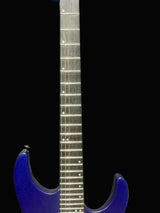 Blue electric guitar neck against a gray background