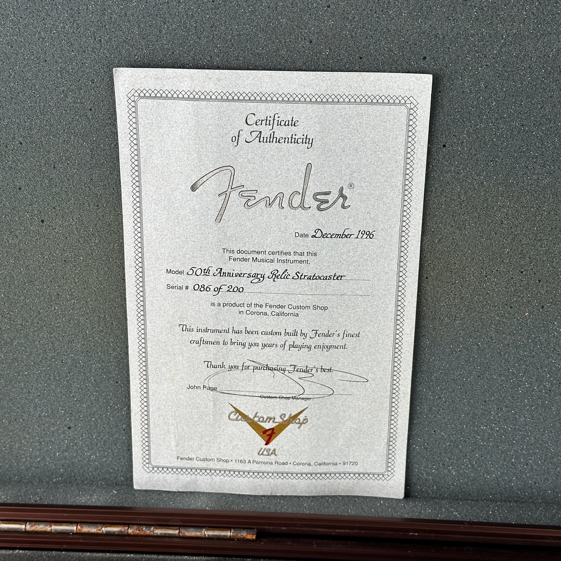 Fender certificate of authenticity on a gray background