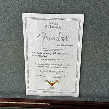 Fender certificate of authenticity on a gray background