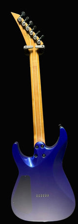 Blue electric guitar with a wooden neck against a gray background