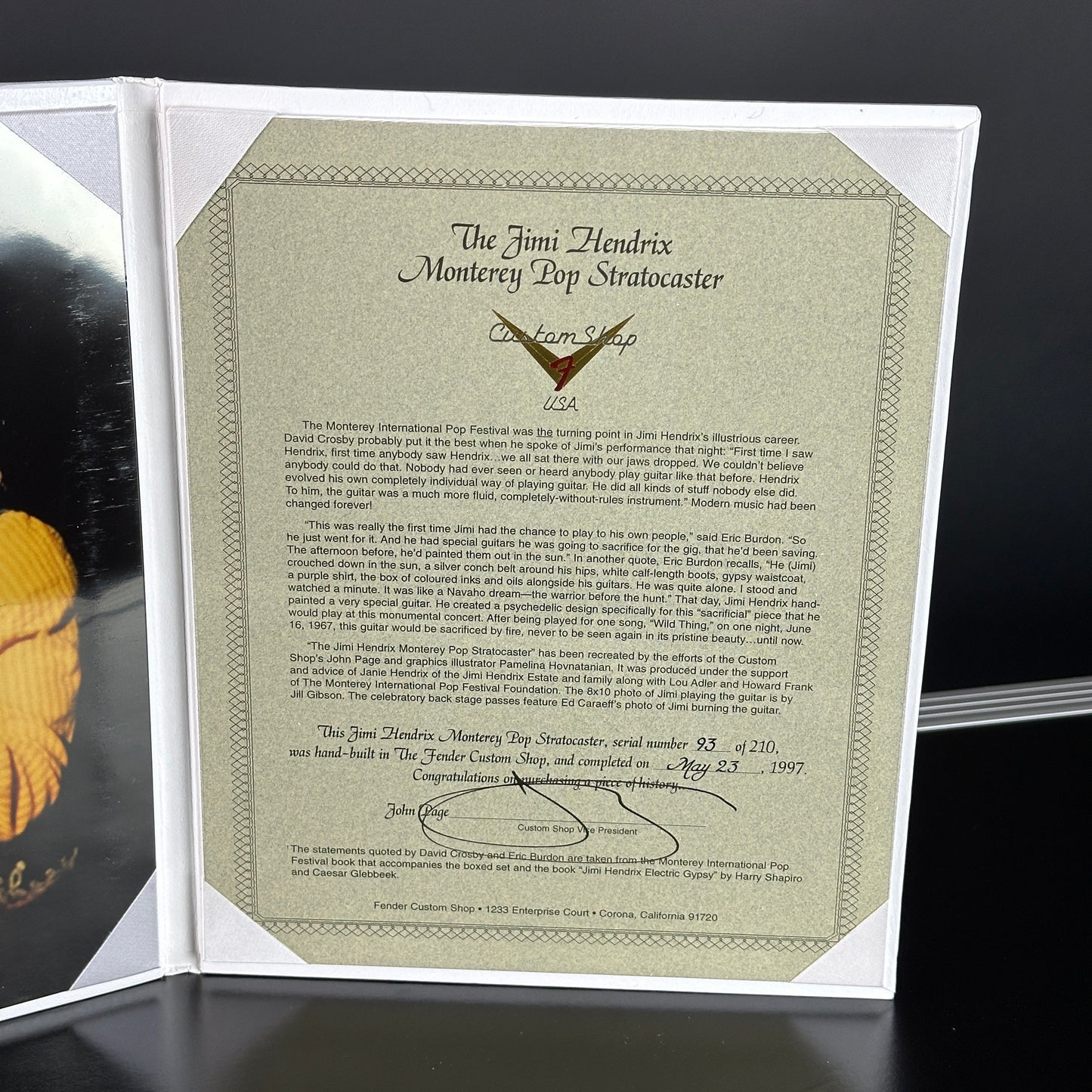 Jimi Hendrix guitar certificate with text and signature on a dark background