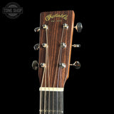 Headstock of Martin Custom Shop  18 Style 0000/M Adirondack/Quilted Mahogany.