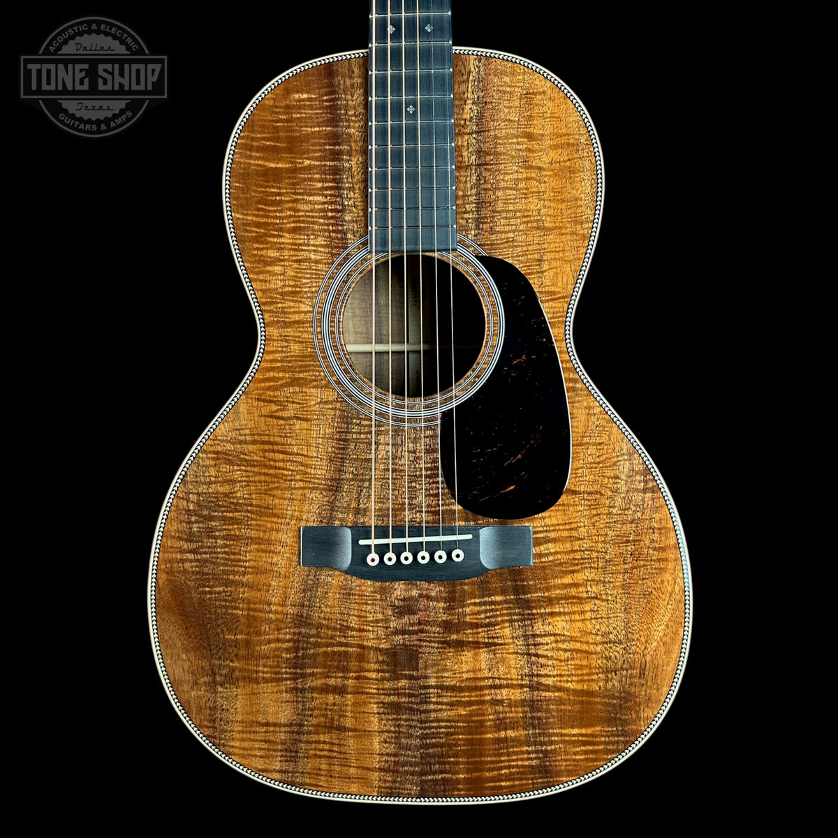 Front of Martin Custom Shop  28 Style 00-12F All Exceptional Broad Figured Koa.