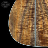 Back detail of Martin Custom Shop  28 Style 00-12F All Exceptional Broad Figured Koa.