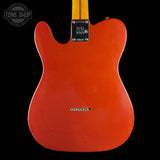 The back of a classic Fender Telecaster electric guitar body in a vibrant orange finish, shown against a solid black background with a Tone Shop watermark in the top left corner.