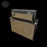 A Fender Roadmaster RG amplifier stack with a black headstage and a matching black speaker cabinet, both featuring beige mesh grilles, shown against a solid black background.
