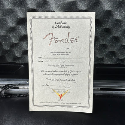 Fender certificate of authenticity on a textured black background