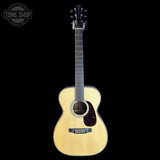 Full front of Martin Custom Shop  28 Style 00-14F Adirondack/Bastogne Walnut.
