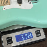 Used 2021 Fender Paul Waller Masterbuilt 50's Elecric Mando Surf Green on scale displaying weight.