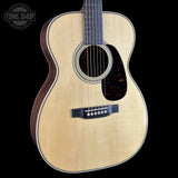 Front angle of Martin Custom Shop  28 Style 00-14F Adirondack/Bastogne Walnut.