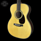 Front angle of Martin Custom Shop  28/45 Style OM Adirondack/Wild Grain East Indian Rosewood.