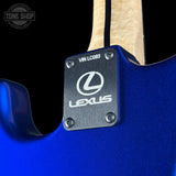 Blue guitar with Lexus logo on a black background