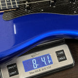 Used 2022 Fender Custom Shop Lexus LC Strat on scale displaying weight.